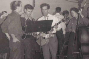 Before Rock ’n’ Roll: The original Everly family, pictured here in March, 1954, performed on radio station WROL when it was located on the top floor of the Mechanics Bank building on Gay Street. Phil, barely 15 at the time, is at left. Don, 17, is on guitar. At right are father Ike Everly, on guitar, and mother, Margaret, on stand-up bass. Source: The Calvin M. McClung Historical Collection, Lawson McGhee Library. Image courtesy of Tennessee Archive of Moving Image and Sound, from the Robert Van Winkle collection.