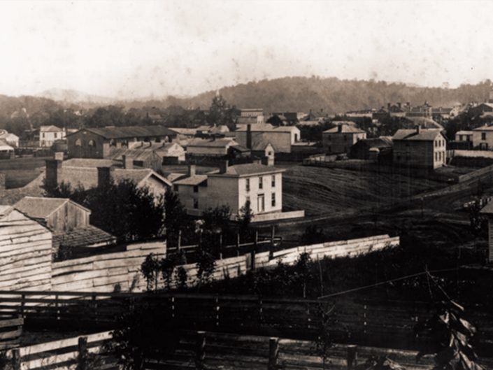 Knoxville, 1859, looking southeast towards the Old Courthouse. The long dark-roofed building center left is believed to be the first market house built five years earlier in 1854. McClung Historical Collection.