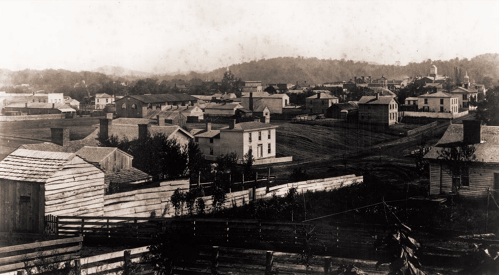 Knoxville, 1859, looking southeast towards the Old Courthouse. The long dark-roofed building center left is believed to be the first market house built five years earlier in 1854. McClung Historical Collection.