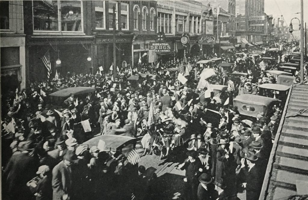World War Armistice celebration on Gay Street. The Hope Brothers clock shows 11:00 am on the 11th of November, 1918. (Cindy & Mark Proteau/KHP)