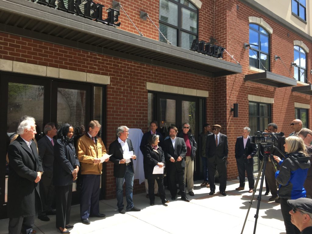 Dedication of a historical plaque at Marble Alley Lofts opposite the Cal Johnson Building on State Street, 2017. (KHP) 