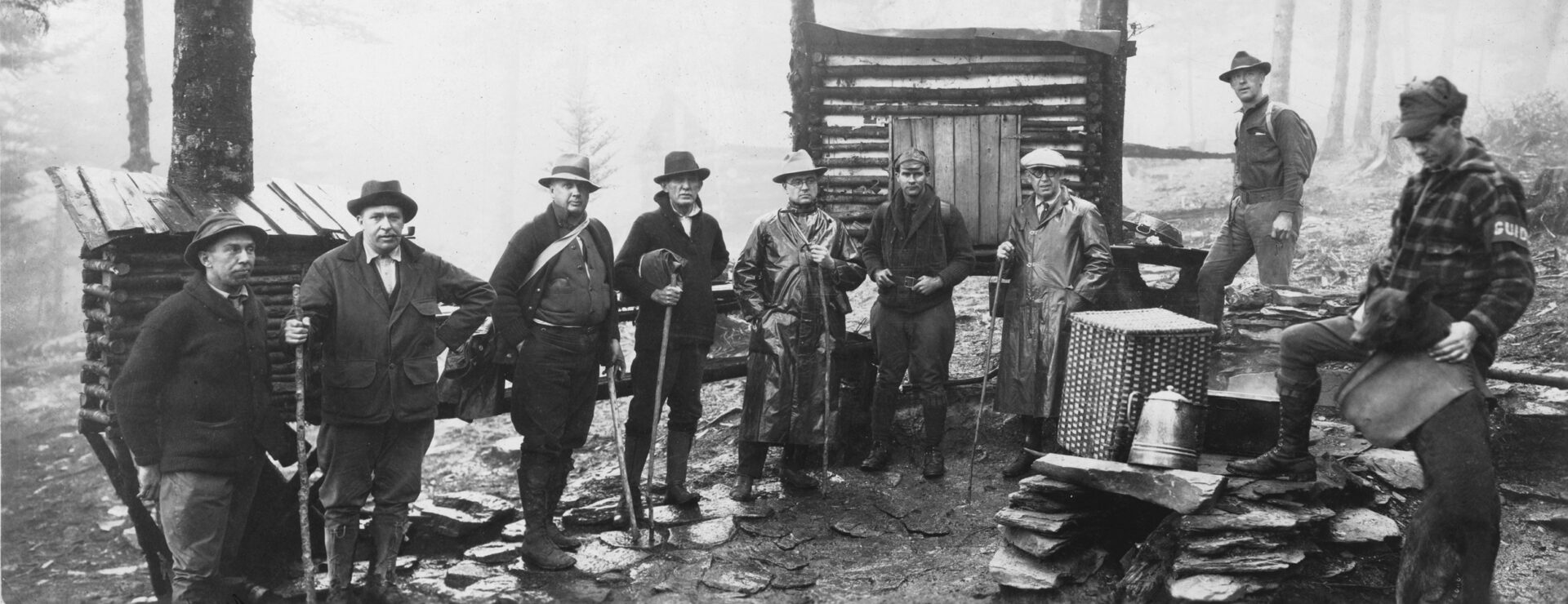 Knoxvillians on Mt Le Conte, 1927. Florist Brockway Crouch is fourth from left; Jim Thompson is second from right, and next to him is trail guide Paul Adams with his legendary dog, Cumberland Jack (or Smoky Jack as he was known when he was in the mountains.) (University of Tennessee Libraries)