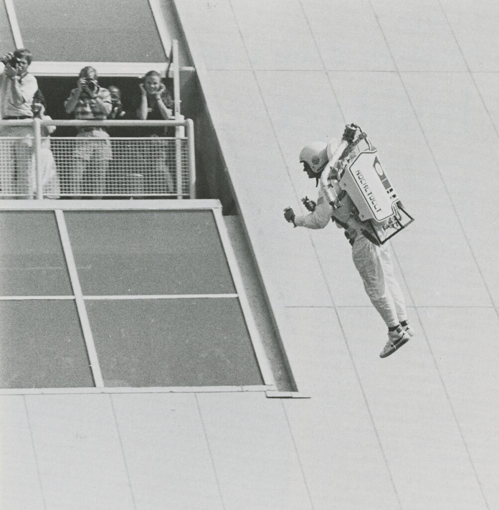 Jet-pack pilot Bill Suitor in flight at the U.S. Pavilion. University of Tennessee Libraries.