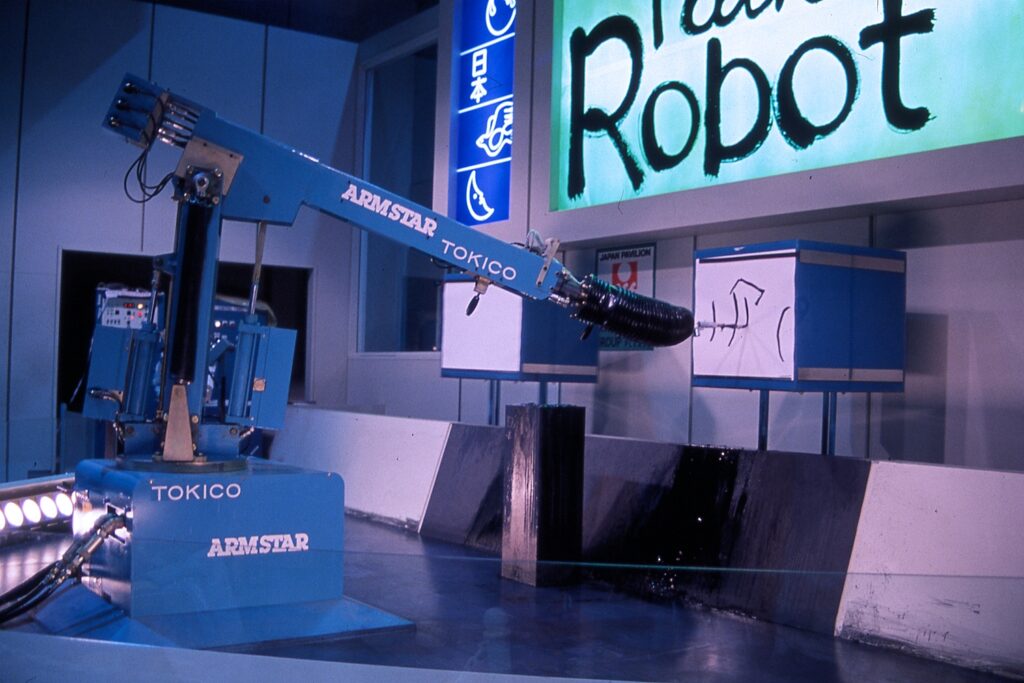 The technologically impressive painting robot delighted crowds at the Japan Pavilion. Courtesy of Paul Holzschuher.